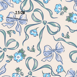 a blue and white flower pattern on a beige background