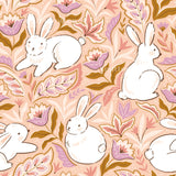 a repeating pattern of white rabbits surrounded by pink and purple flowers and leaves.