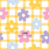 a pattern with flowers on a checkered background