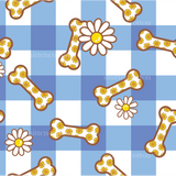 a blue and white checkered table cloth with flowers and bones