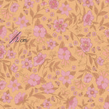 a pink flower pattern on a yellow background