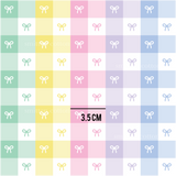 a pattern of bows on a multicolored background