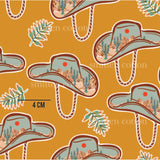 a pattern of hats and cactus plants on an orange background