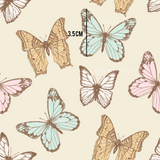 a group of butterflies on a beige background