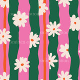 a pink and green striped background with white flowers