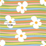 a colorful striped background with flowers on it