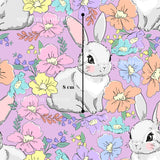 a repeating pattern of cartoon rabbits surrounded by colorful flowers and leaves. The rabbits are depicted in various poses, and the flowers and leaves are arranged in a visually appealing manner. The image does not contain any text or specific details about the rabbits or flowers, and it does not include any measurements or descriptions.