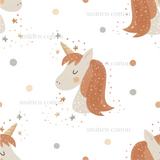 a pattern of a unicorn with stars on it