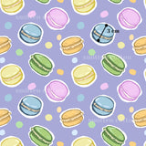 a repeating pattern of colorful macarons against a purple background.