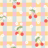 a checkered table cloth with cherries on it