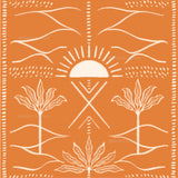 an orange and white print with trees and a sun