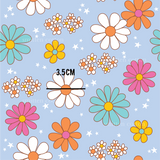 a blue background with flowers and stars on it