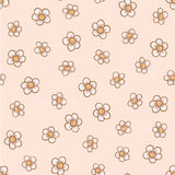 a pink background with brown flowers on it