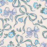 a pattern of blue flowers and bows on a beige background