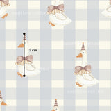 a pattern of cartoon ducks wearing party hats and bow ties, with a measurement scale visible in the bottom left corner.