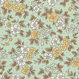 a floral pattern with brown, white, and yellow flowers