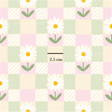 a picture of a flower on a checkered background