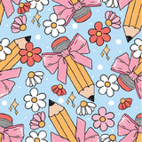 a pattern of pencils and flowers on a blue background