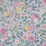 a blue background with colorful flowers and leaves