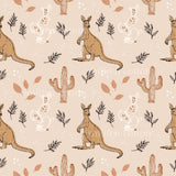 a pattern of kangaroos and cactus leaves on a pink background