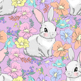 a repeating pattern of cartoon rabbits surrounded by colorful flowers and leaves in various shades of pink, yellow, blue, and orange.