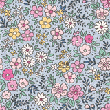 a blue background with colorful flowers and leaves