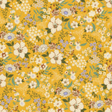 a yellow background with flowers and leaves
