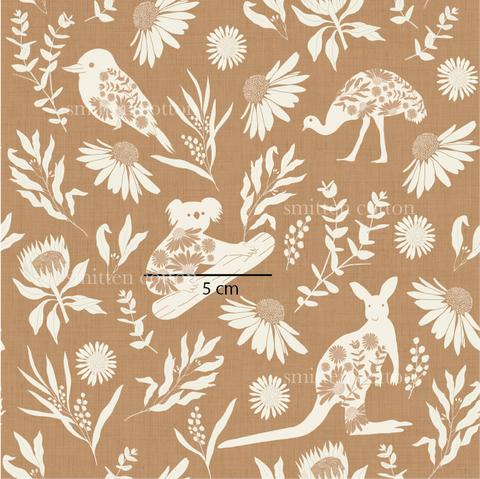 a brown and white floral pattern with birds and flowers