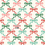 a pattern of colorful bows on a white background