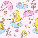 a variety of cartoon-style illustrations, including ducks wearing raincoats and umbrellas, as well as other whimsical elements such as flowers, mushrooms, and ladybugs. The overall scene appears to be a playful and colorful composition.