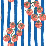 a repeating pattern of red tomatoes on a blue and white striped background.