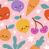 a variety of colorful fruits and vegetables, including apples, oranges, lemons, cherries, and carrots, all with cheerful faces and leaves. The background is a light pink color with white stars scattered throughout, creating a whimsical and playful atmosphere.