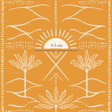 an orange and white pattern with a sun in the background