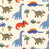 a repeating pattern of various colorful dinosaurs and tropical plants, including a blue dinosaur, a red dinosaur, and a green dinosaur, along with palm trees and other natural elements.