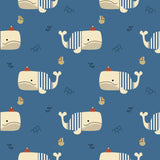 a repeating pattern of cartoon-style whale illustrations on a blue background, along with small boats and clouds.