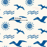 a repeating pattern of blue birds and sun-like symbols, with a line of text indicating the size of the pattern in centimeters.