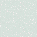 a light green background with white polka dots