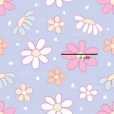 a pink and blue flower pattern with stars