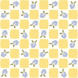 a repeating pattern of yellow squares and blue flowers on a white background.
