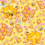 a pattern of honey bears and honeycombs