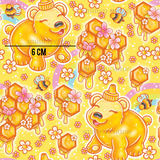 a pattern of honey bears and honeycombs