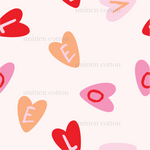 a pattern of hearts and letters on a white background