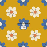 a repeating pattern of blue and white flowers against a yellow background.