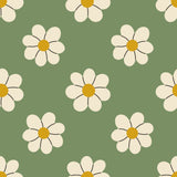 a repeating pattern of white daisy-like flowers with yellow centers against a green background.