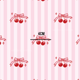 a pattern of cherries on a pink background