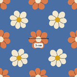 a repeating pattern of white and orange flowers against a blue background.