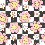 a pattern with a flower on a black and white checkered background