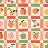 a pattern of apples and oranges on a checkered background