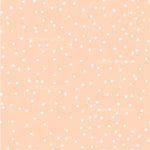 a white polka dot pattern on a peach background