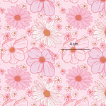 a pink and white flower pattern on a pink background